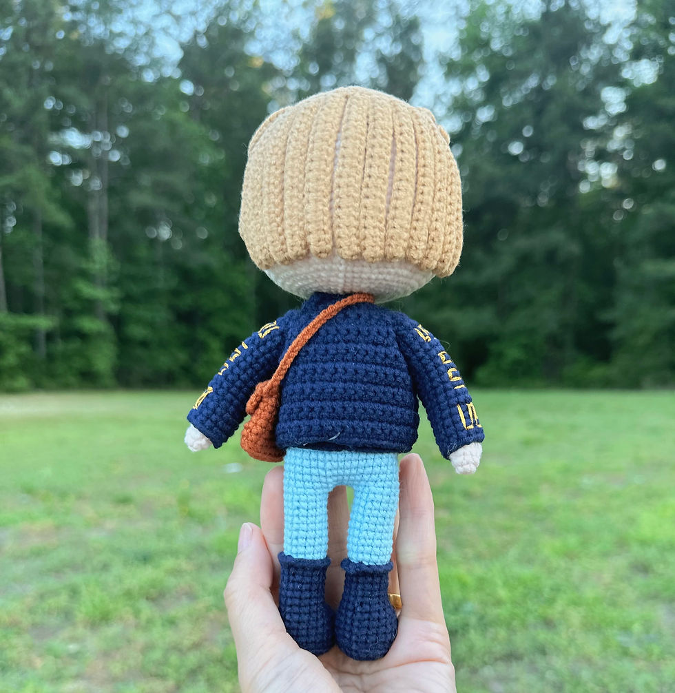 Thumbnail: handmade Fiyero-inspired amigurumi crochet doll