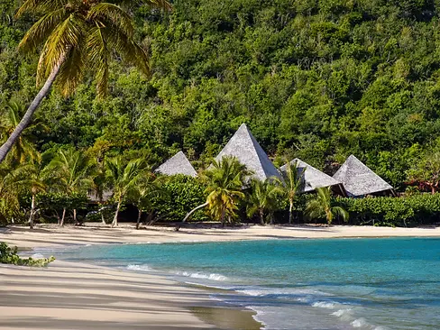 Rosewood-Little-Dix-Bay-Beach-with-Pavilion-Gold-List-Oct24-Pr-Global.webp