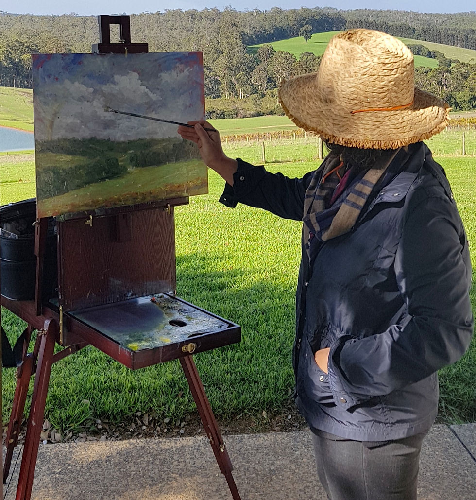 Marjan working on an oil painting at the Koomal Creek Wines competition in Pemberton!