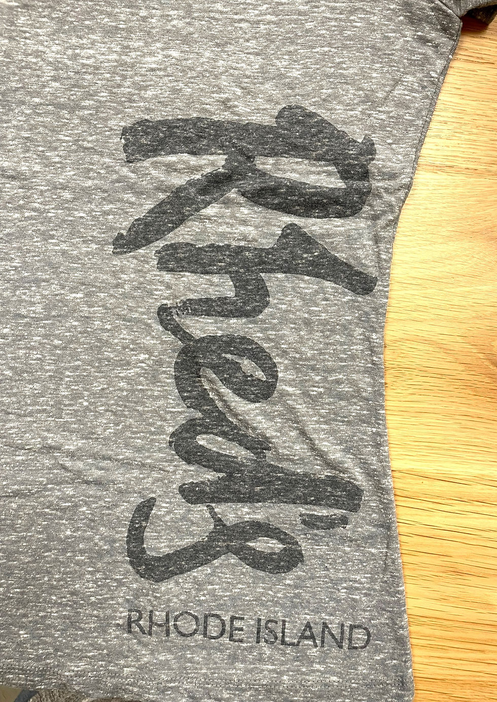 Thumbnail: Side of gray women's shirt with Rhed's typeface vertical down the side.