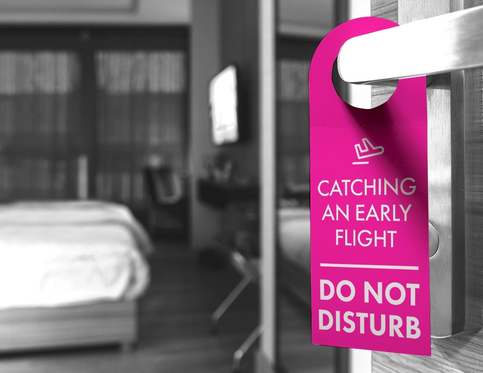 do not disturb sign on an airport hotel door