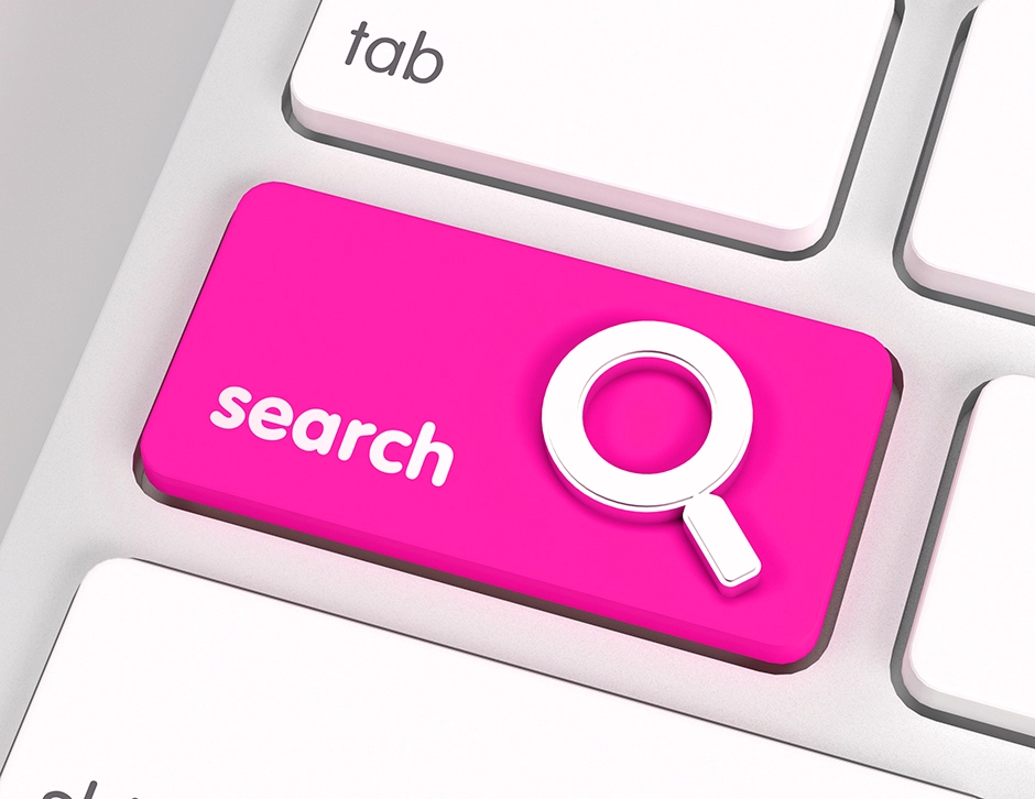 pink search button on a keyboard