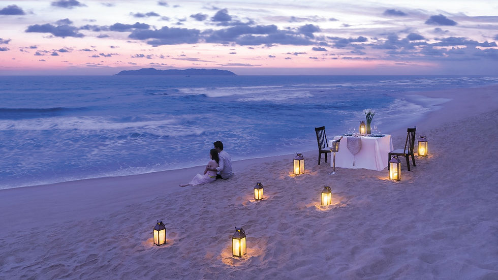 Honeymoon couple beach dinner