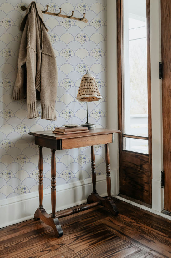 Scallop wallpaper pattern framing individual watercolor flowers