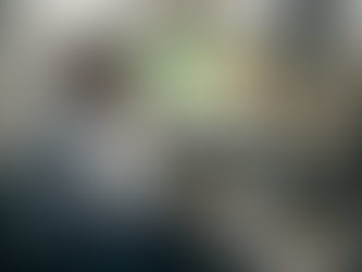 Supervisor reviewing budget in corner office