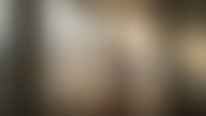 Swiss video producer setting up camera in office