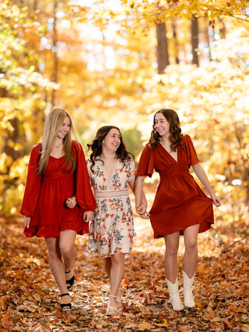 senor girls wearing orange fall dresses