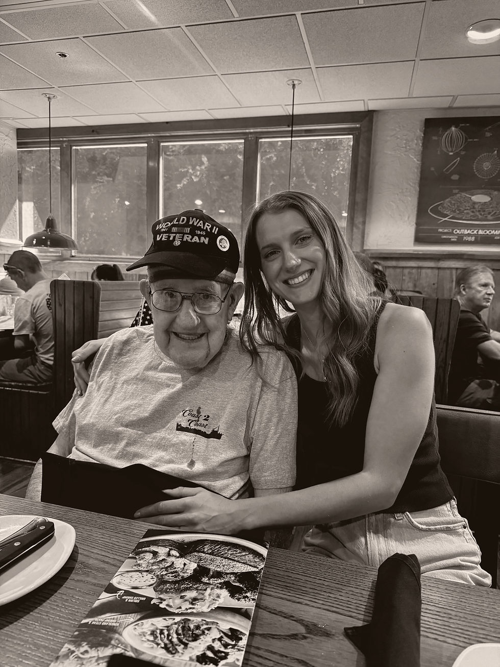 Amanda Andrus with her grandfather, Earnest (“Earnie”) Andrus, at his 102nd birthday party. https://www.jacksonville.com/story/news/2016/08/18/92-year-old-wwii-navy-vet-just-few-miles-short-atlantic-coast-coast/15721393007/