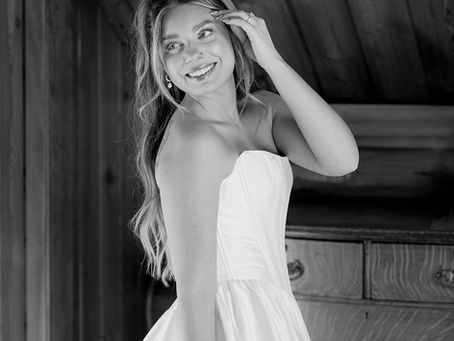 Bride wearing a dress from Hannah Jane Couture, black and white.