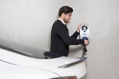 Plugging-in Tesla in Garage.jpg