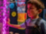 Young boy looking at sensory installations