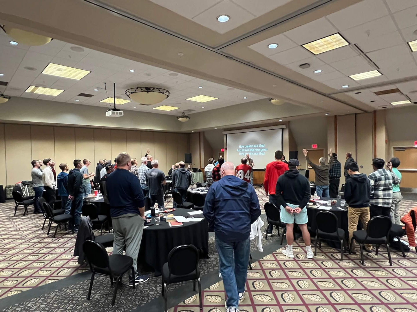 Men's ministry group meeting in large room