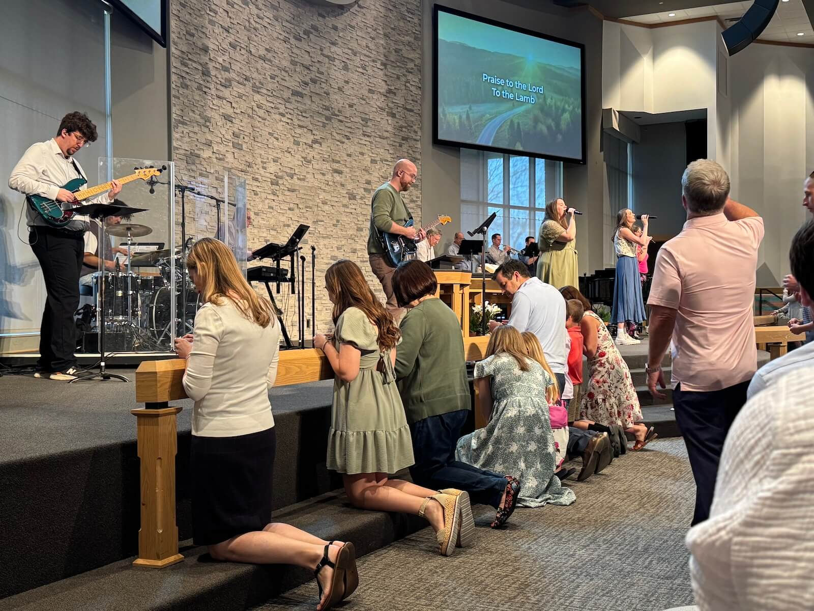 Band and congregation worshiping together