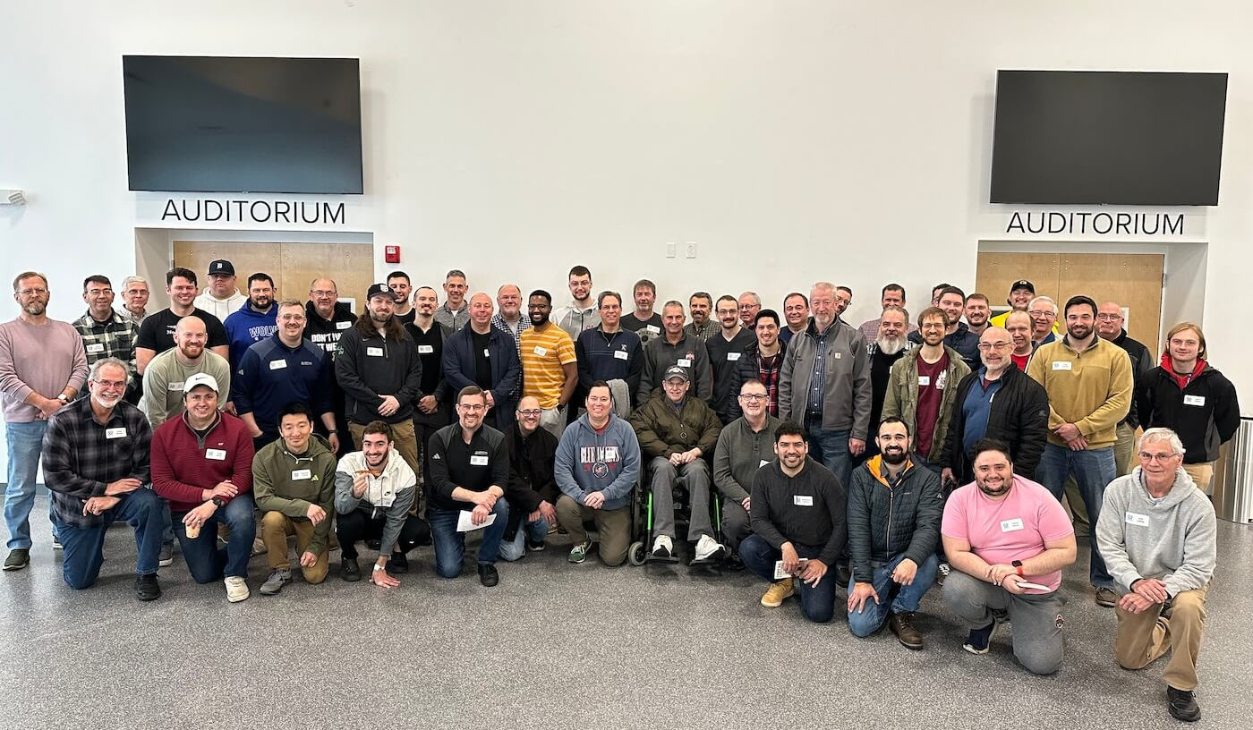 Large group photo: Men’s Ministry members at Auditorium
