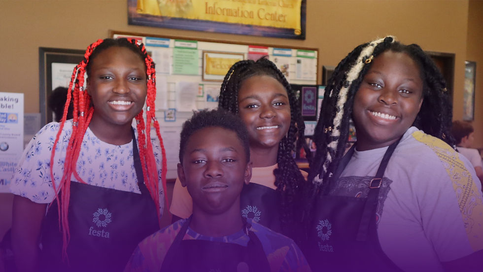 a group of people smiling at the camera