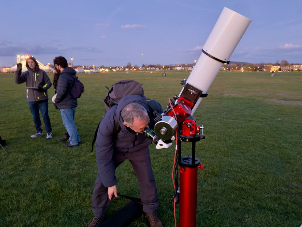 Tony viewing Jupiter through my scope at the start of the. evening. Picture by Mike Meynell.