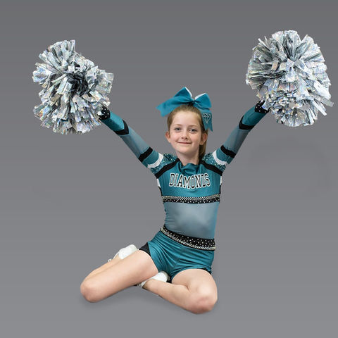 Kuna Diamonds Cheerleader posing on the ground with pom-poms