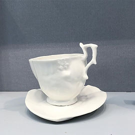 Minimus maximus cup and saucer at the British Craft Trade Fair, Brick Lane, London.jpg