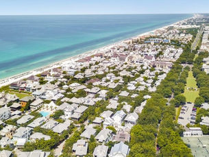 Scenic 30A Florida beach with white sand and turquoise Gulf of Mexico waters.