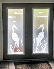 Mirrored Main Door Design with Blue Herons decorative front doors with glass