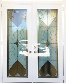Love Conquers All - Hearts and Diamond decorative glass entry doors