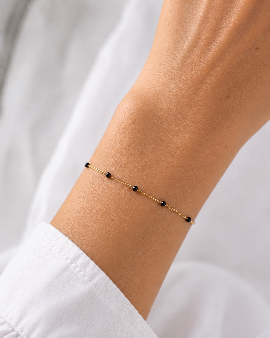 Bracelet gourmette Spinelle noire porté