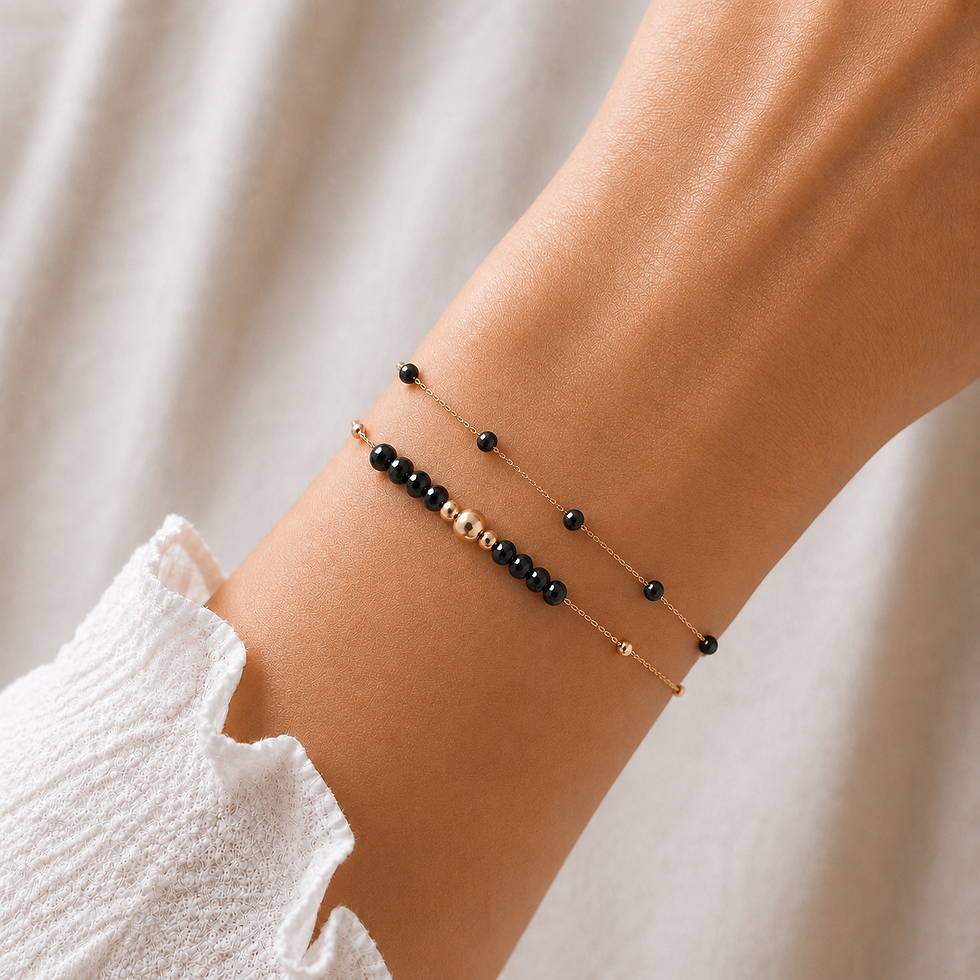 Bracelet double rang spinelle noire doré porté