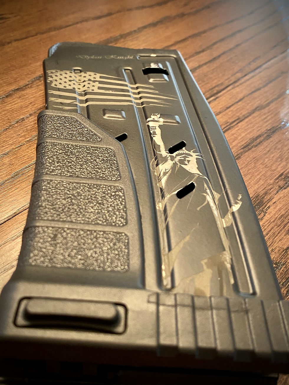 Statue of Liberty and American flag engraved on magazine