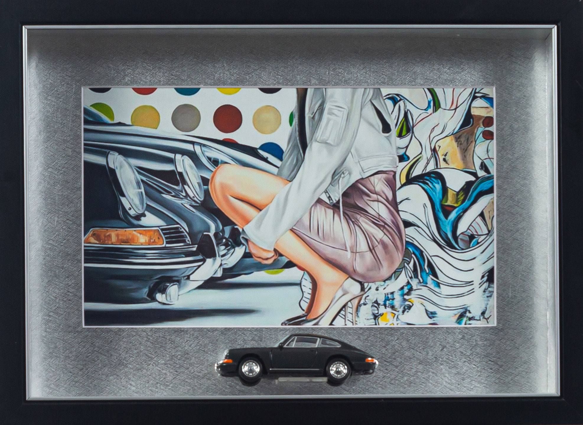 Framed classic Porsche 911 diorama with black diecast model and modern graffiti style art background.