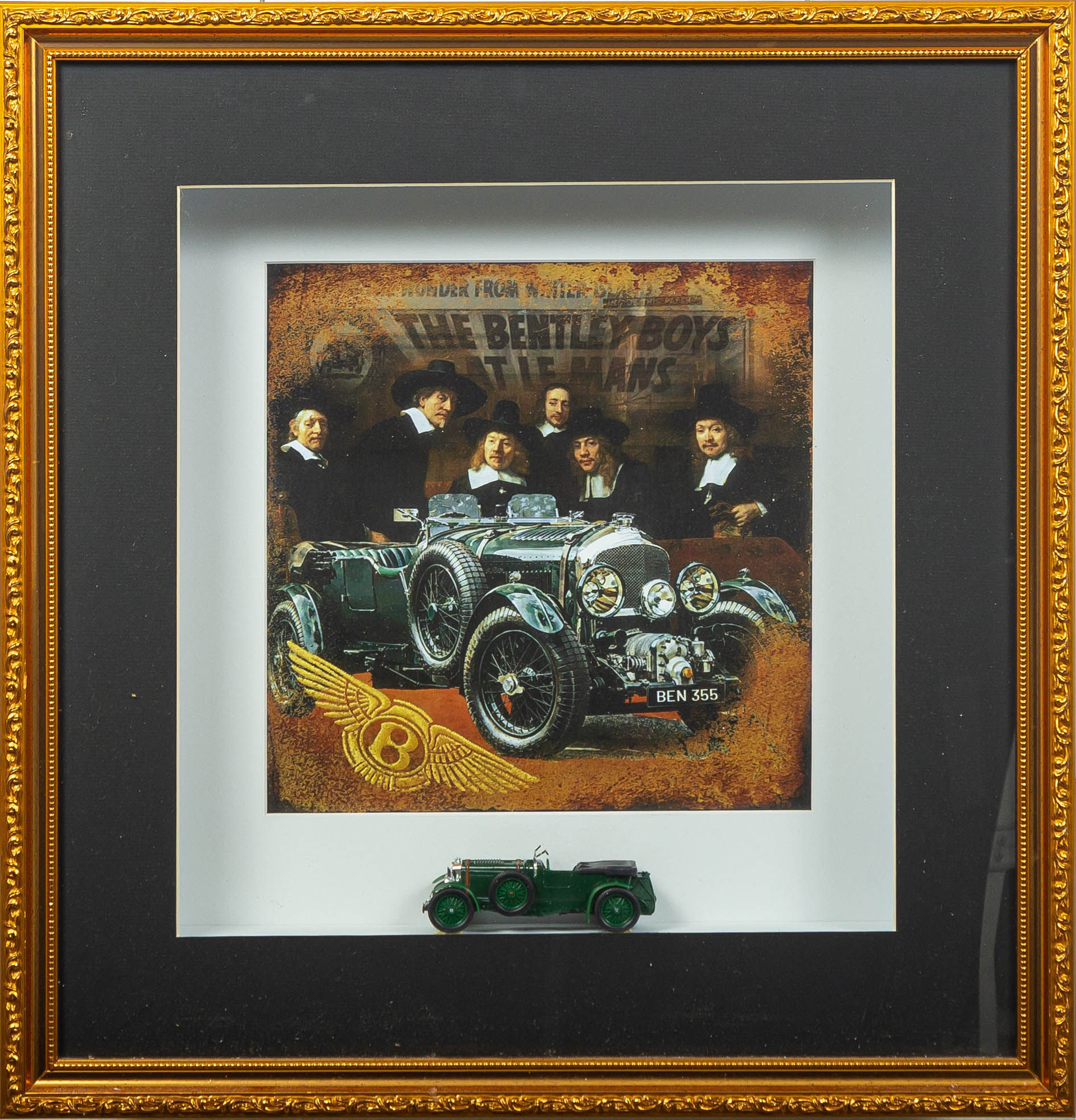 Framed Bentley Blower diorama with green diecast model and vintage Bentley Boys Le Mans art in ornate gold frame.