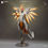 Thumbnail: detailed 3D model of the Overwatch character Mercy, standing with her staff in her left hand, her glowing wings outstretched,