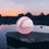 Thumbnail: Bath Bomb sitting on rock Rose Petal Flavor. 