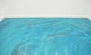 Stunning teal metallic epoxy floor