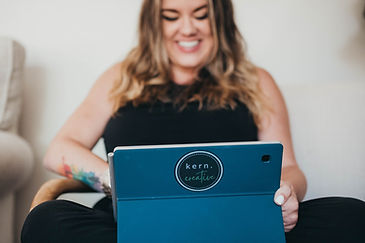 woman working on computer smiling