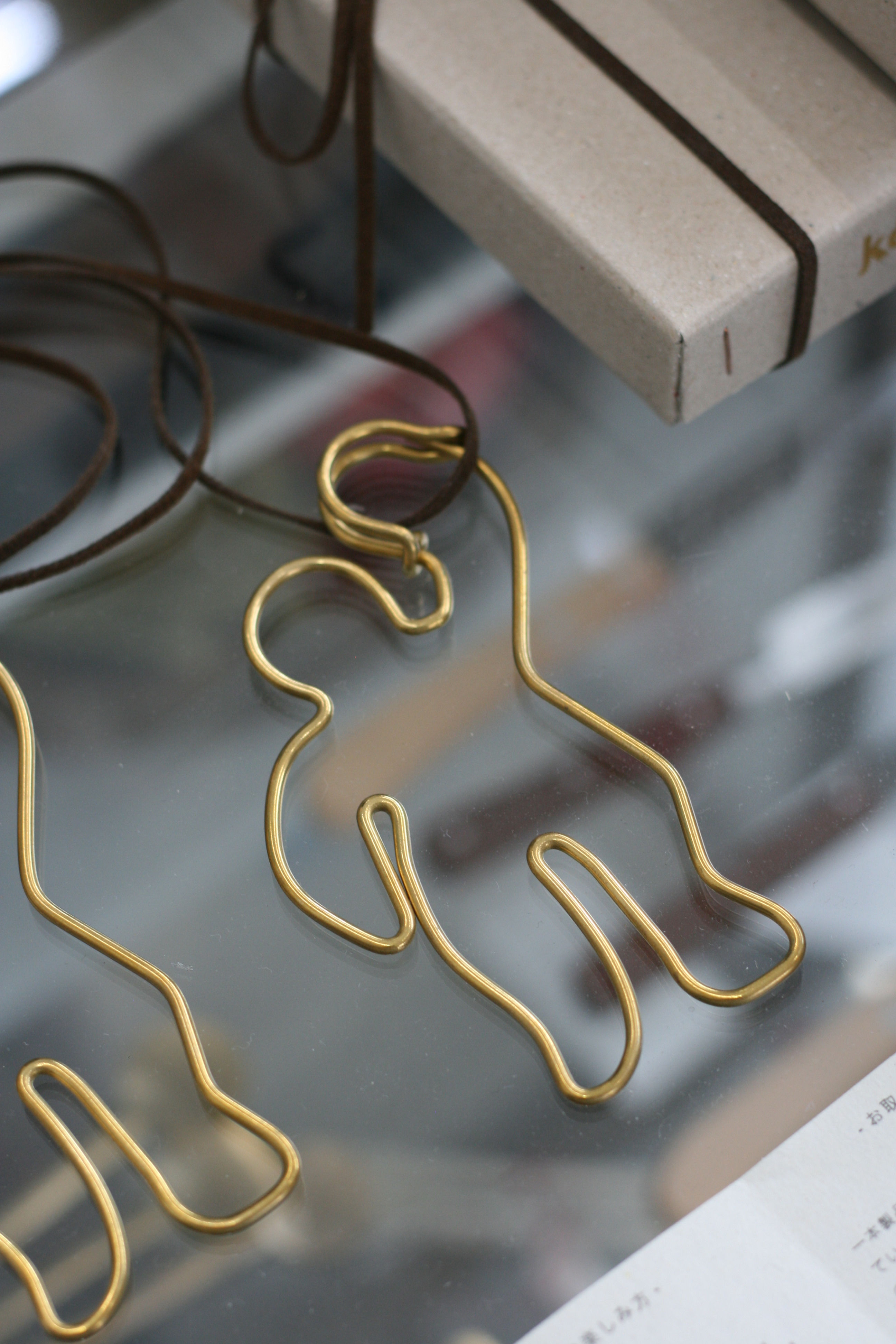 brass pincharm "hito"