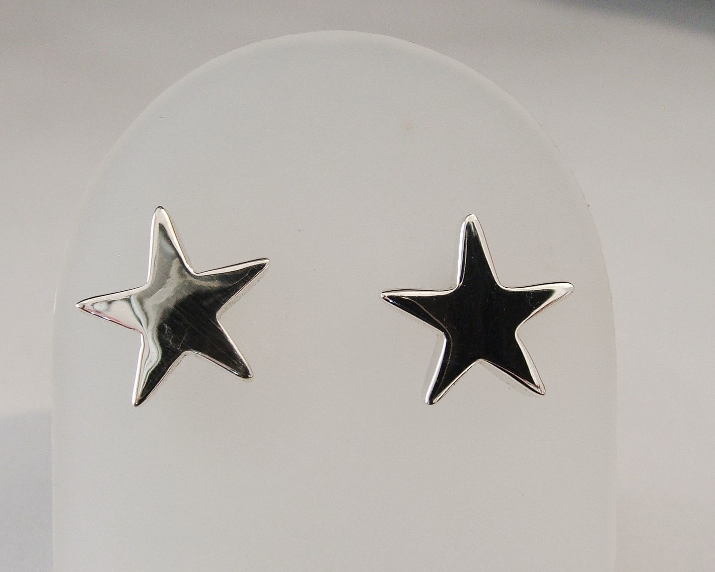 Aretes De Estrella Cartoneada En PlataLey 0.925