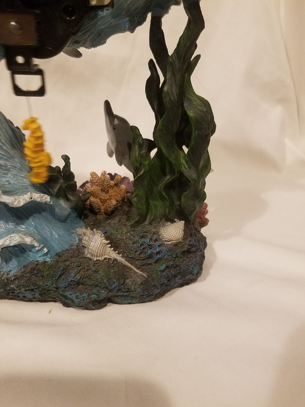 Thumbnail: Ceramic dolphin clock with a water globe
