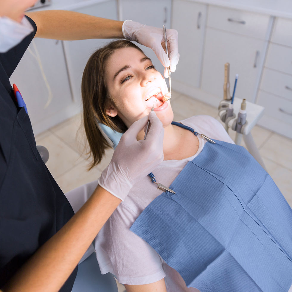 close-up-woman-getting-dental-check-up.jpg