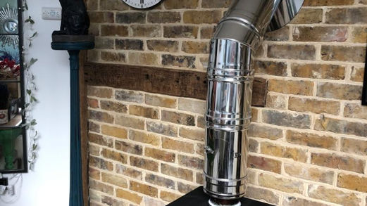 London Yellow Brick Wall and Log Burner