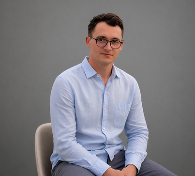 Professional studio portrait with soft lighting.png