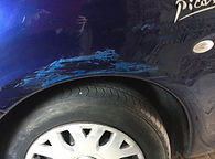 Wing scratch repair before picture