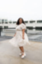 Kaleigh Madison's Spring and Summer Outfit Inspo with Southern Throne - Flowy tan floral dress with pleated design