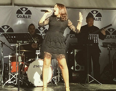 Rossella Fanelli singing for Co.As.It at the Italian Forum in Sydney