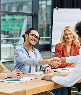 Employee Solutions - Handshake during job interview.jpeg