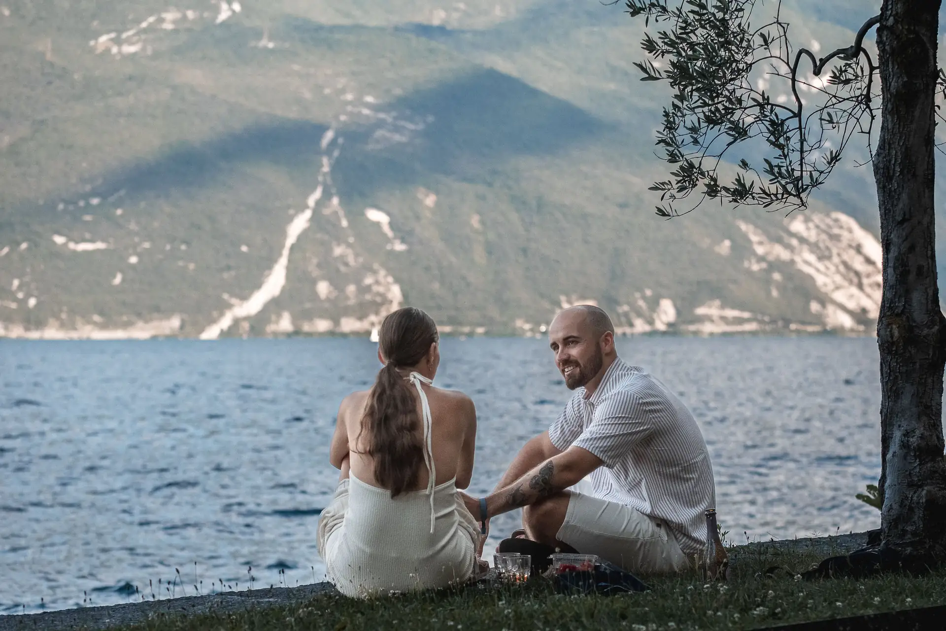 Couple celebrating their engagement near Limone sul Garda with Nick Gritti