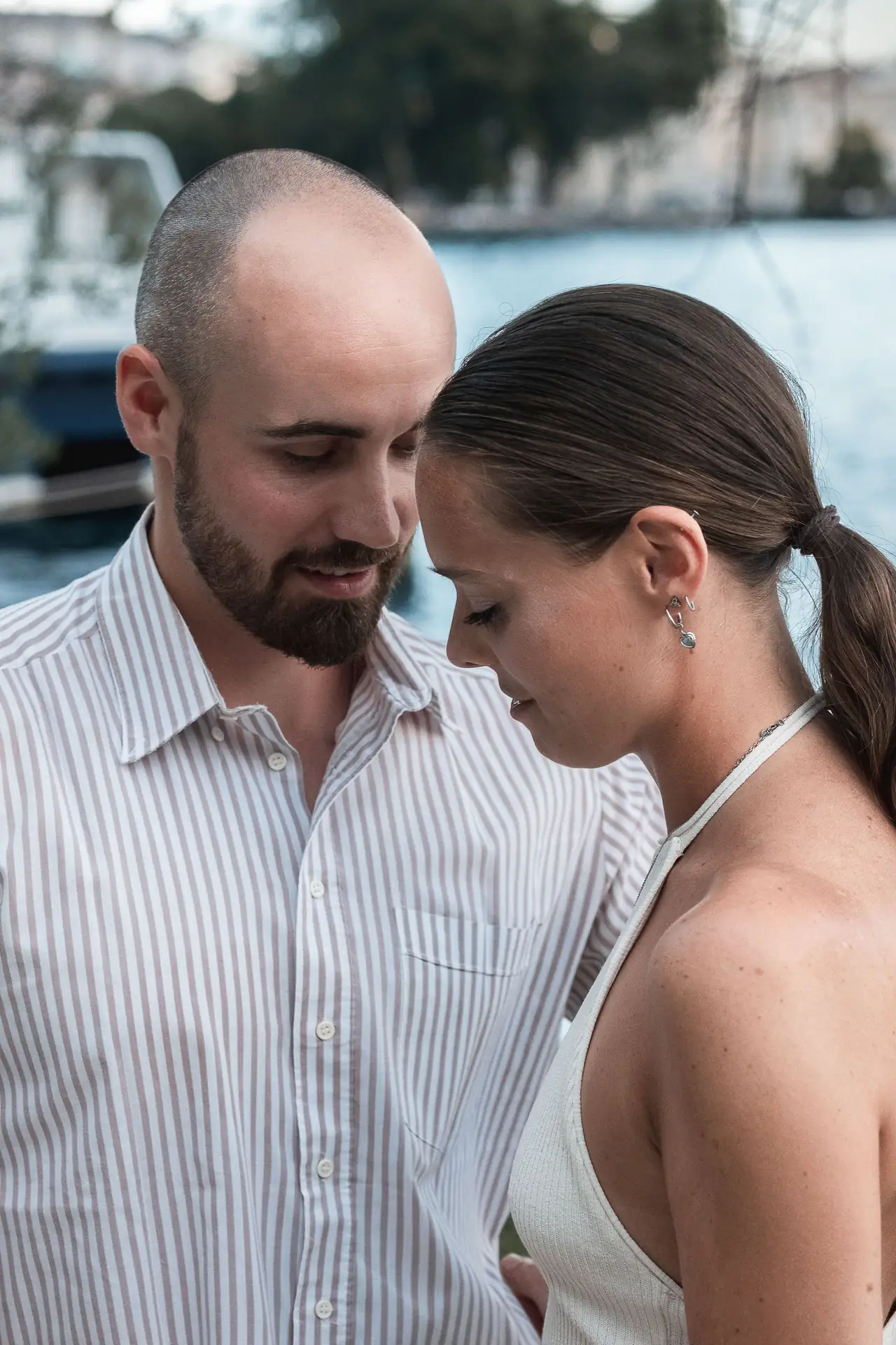 Aaron and Tamara hugging after the surprise proposal in Limone sul Garda