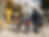 A documentary photograph of a diverse expat family walking to school together in a Portuguese neighborhood, representing social integration.