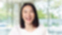 Smiling woman with straight teeth, showcasing the positive results of dental care and restoration at Singapore Dental Implant Centre.