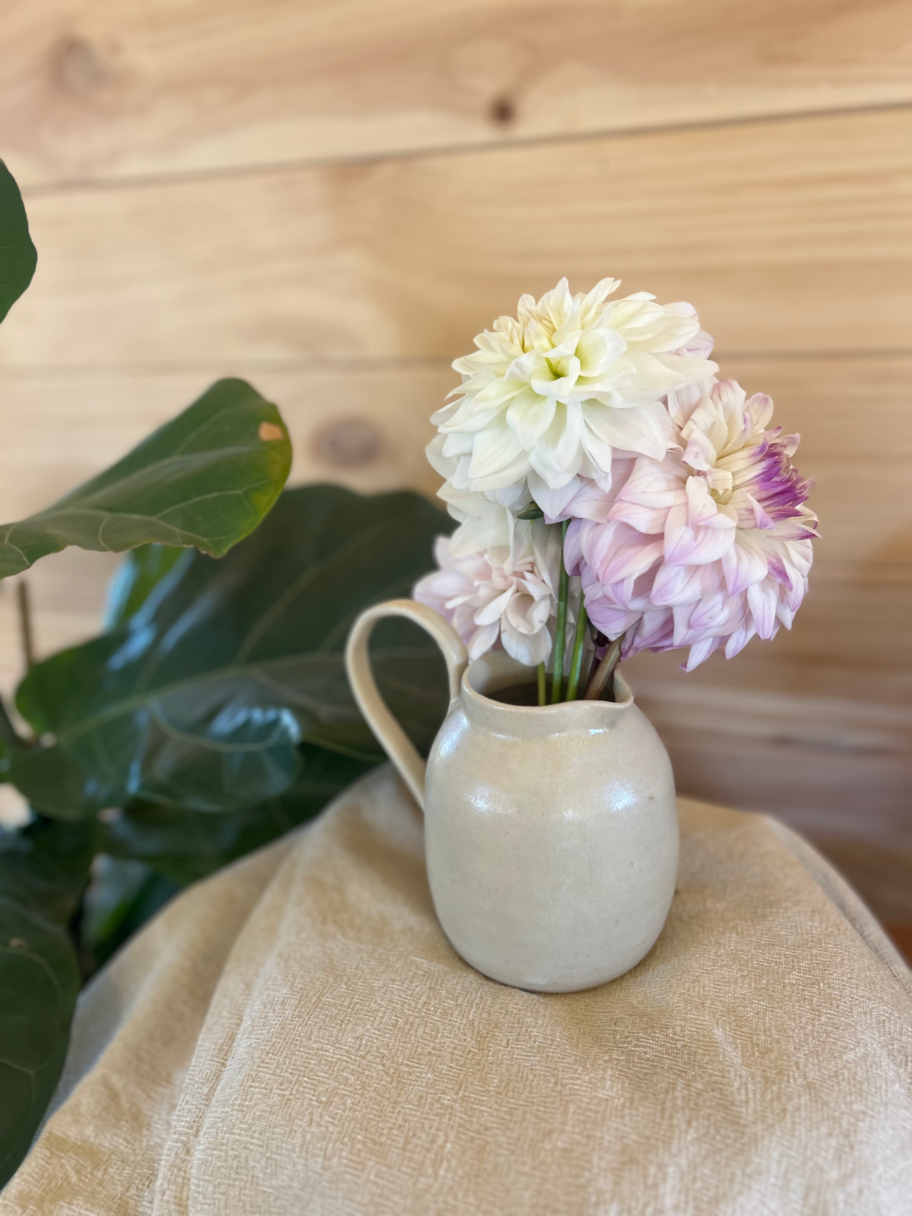 handmade ceramic jugs with earthy stoneware glazes