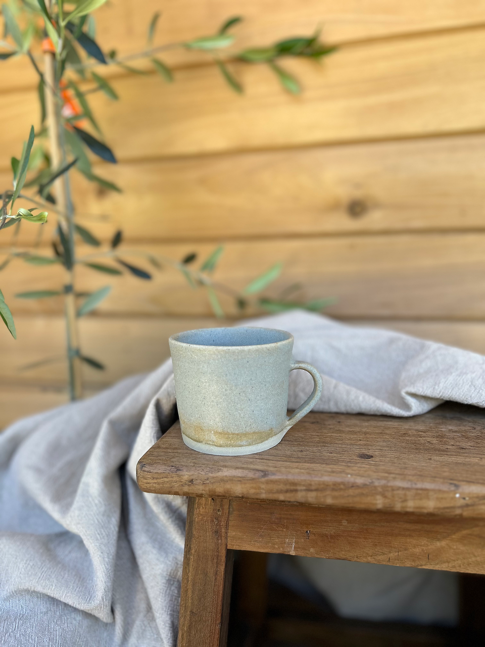 handmade ceramic mug in earthy stoneware glaze